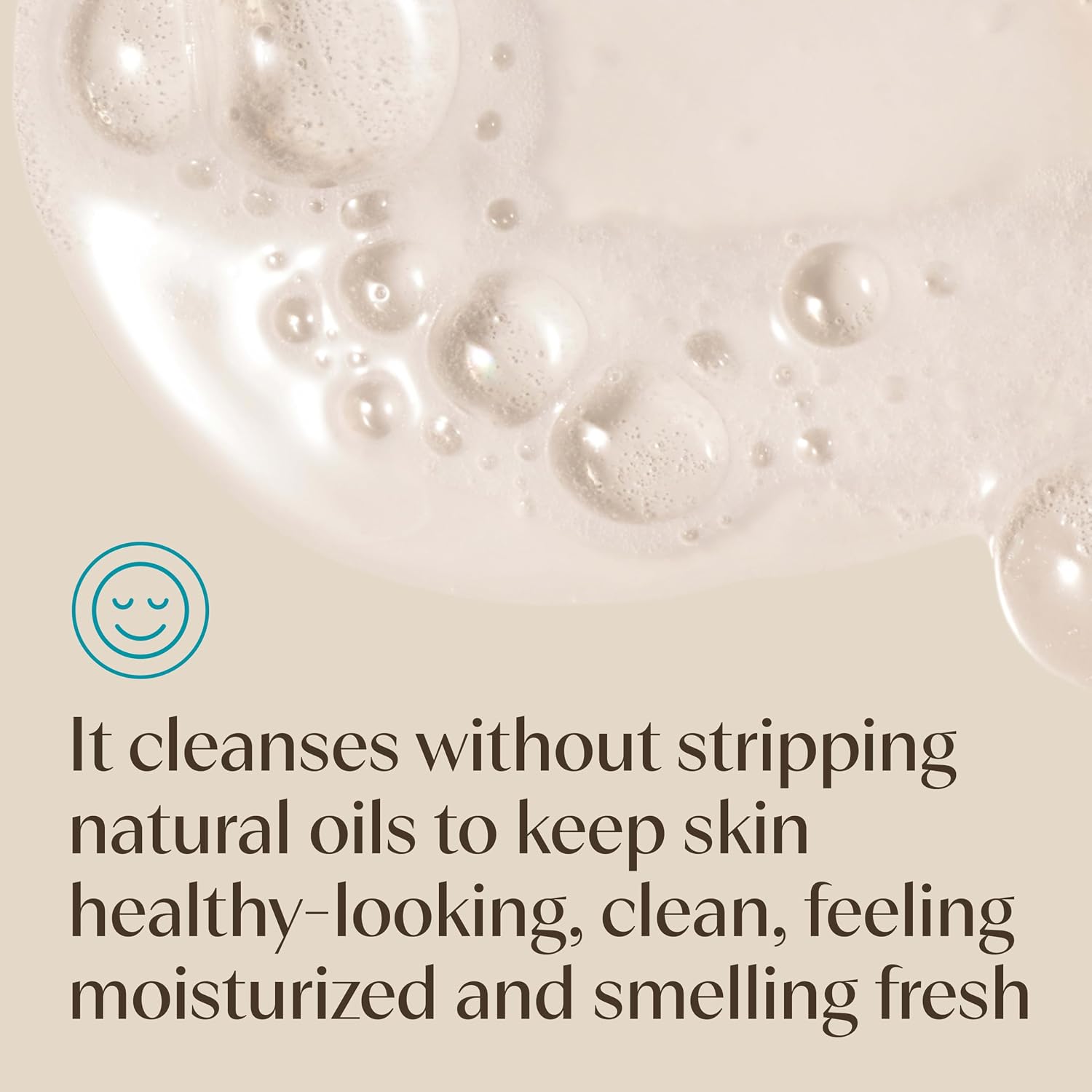 Close-up of creamy wash lather with the line that it cleanses without stripping natural oils